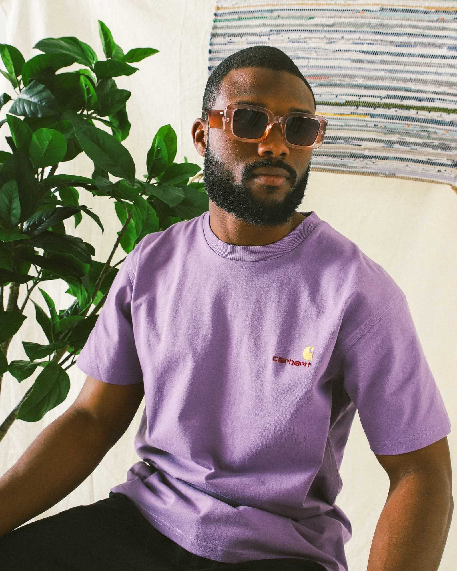 komono glasses with purple carhartt t-shirt